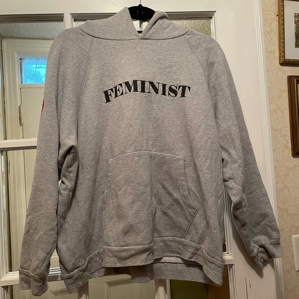 Feminst hoodie with heart on the sleeve
